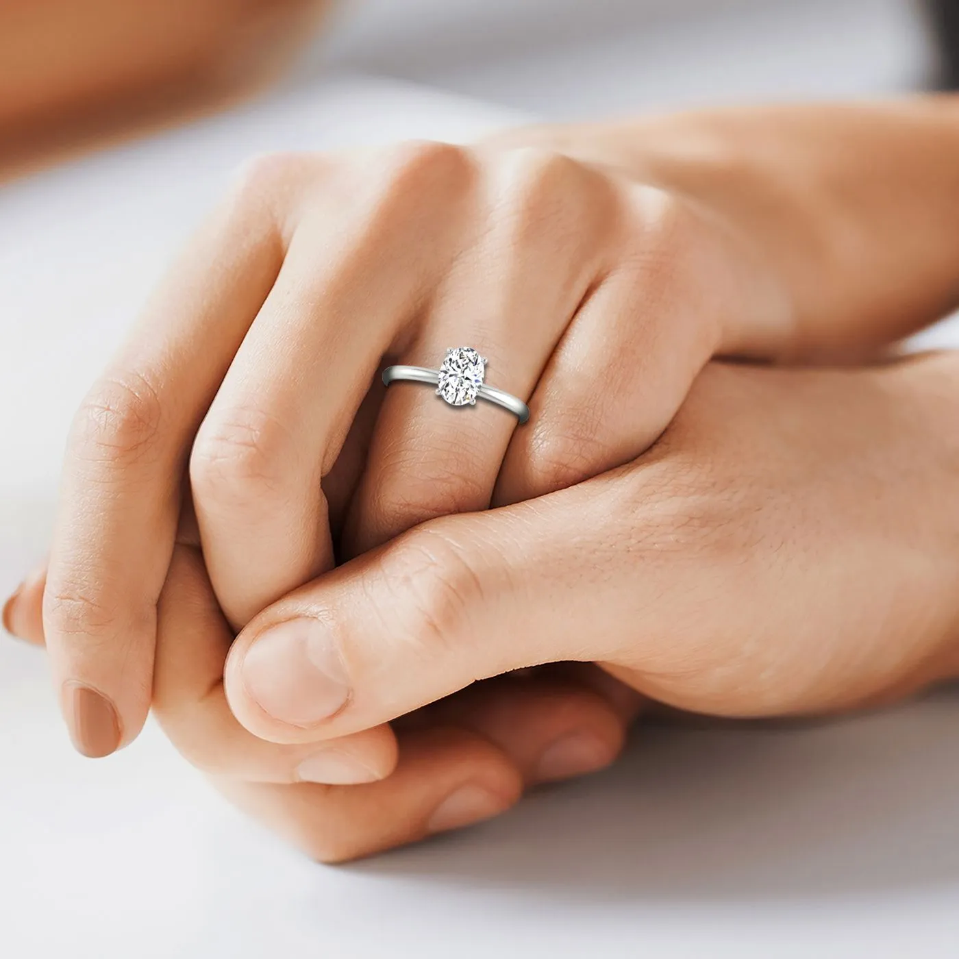 Plat Oval Solitaire Engagement Ring With Lower Hidden Halo Curved With 8 Prong Set Round Diamonds