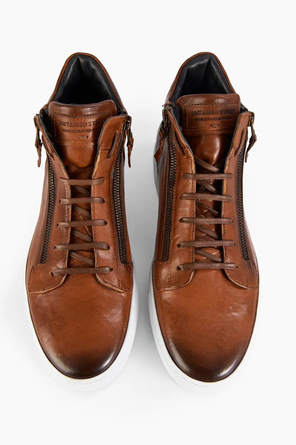 SOHO ROGUE cognac distressed high sneakers.